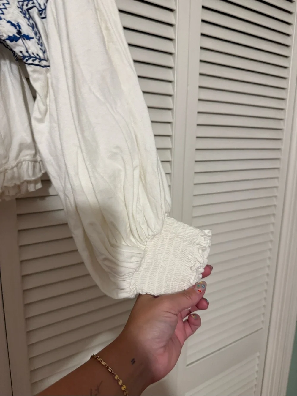 Free people Boho White Peasant Top with blue Embroidery
